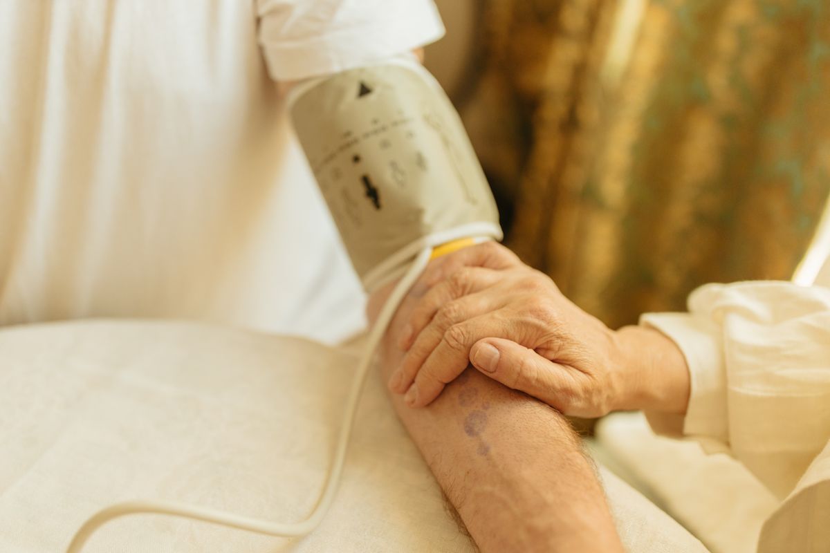 Close-up of a blood pressure reading on a person's arm